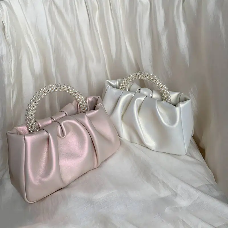 Spring and summer new style fashionable and versatile texture pearl pleated cloud pearlescent sweet pink handbag evening bag