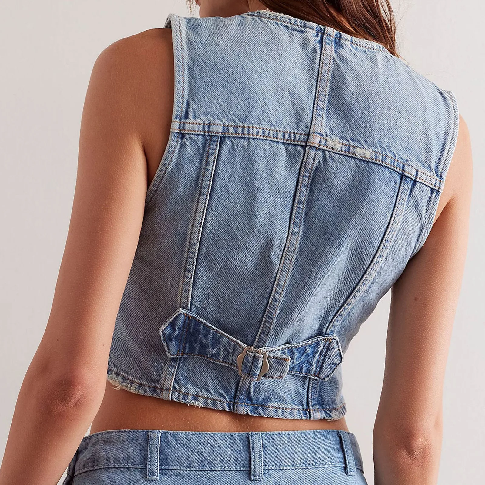 春の新女性ファッションデニム V ネックベストシングルブレストノースリーブジャケットヴィンテージジャンチョッキ女性ショートトップス