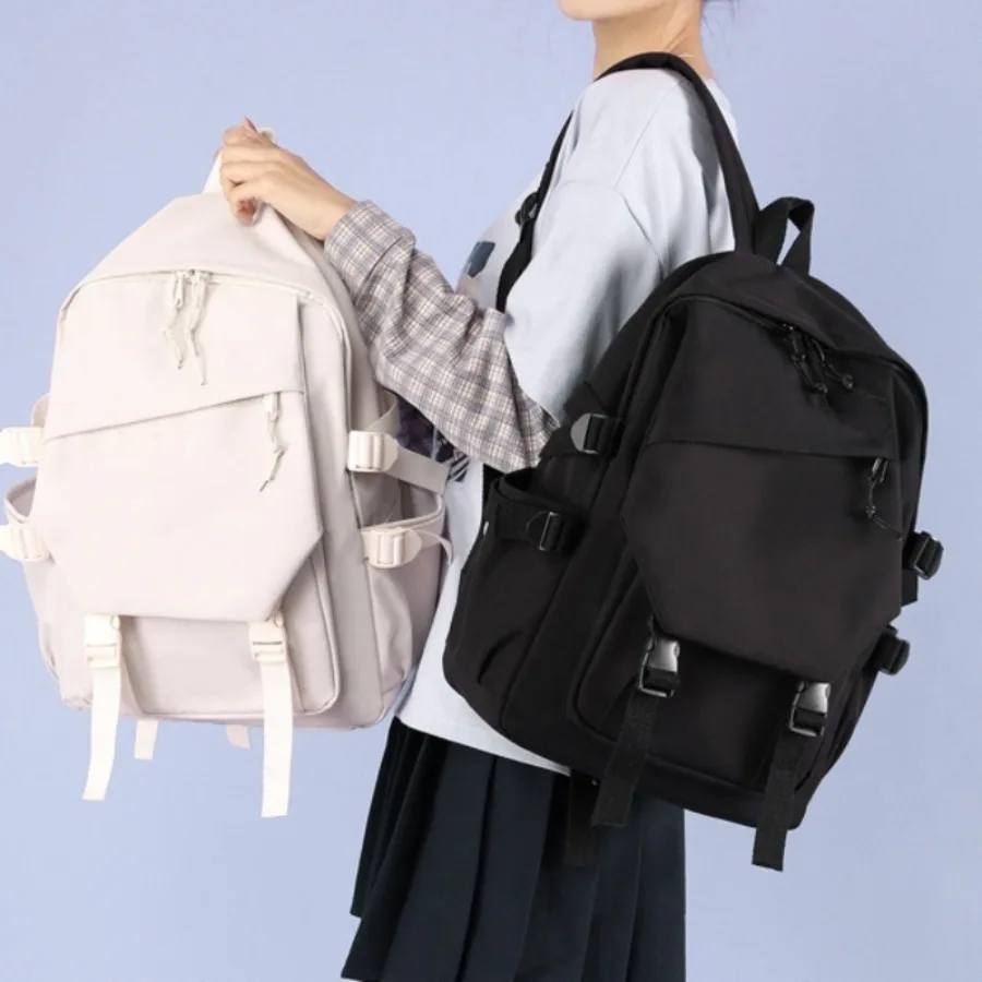 

Japanese simple graffiti color collision backpack junior high school students female shoulder bag small fresh literary bag