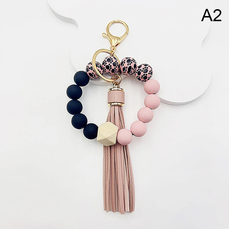 Creative Silicone Tassel Wood Bead Wrist Keychain Bag Pendant Wristlet Keychain Bracelet With Leather Tassel Car Keychain