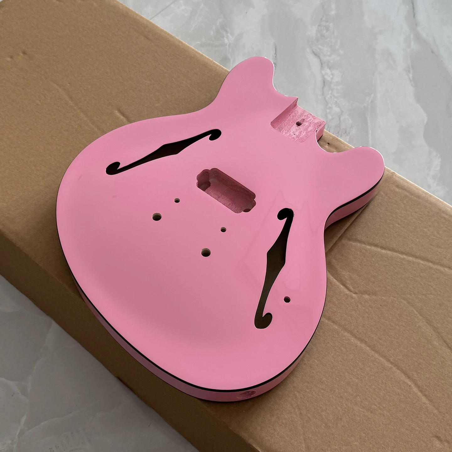 High quality Starcaster electric guitar body,pink shell-shaped guitar body,black edge,in stock