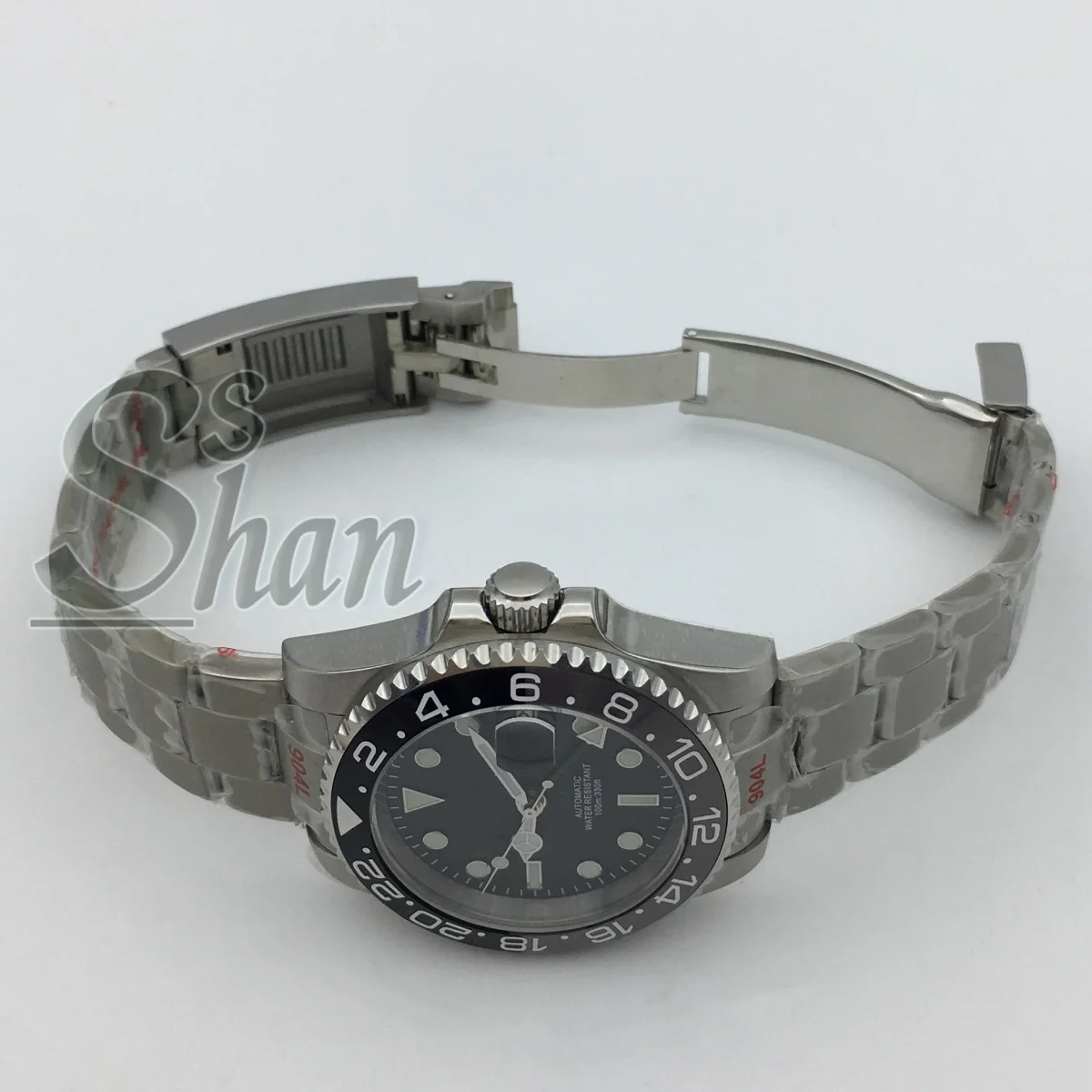 Montre mécanique de luxe NH34 GMT, logo personnalisé, 40mm, lunette en céramique, verre saphir, cadran lumineux vert, résistant à l'eau jusqu'à 10ATM