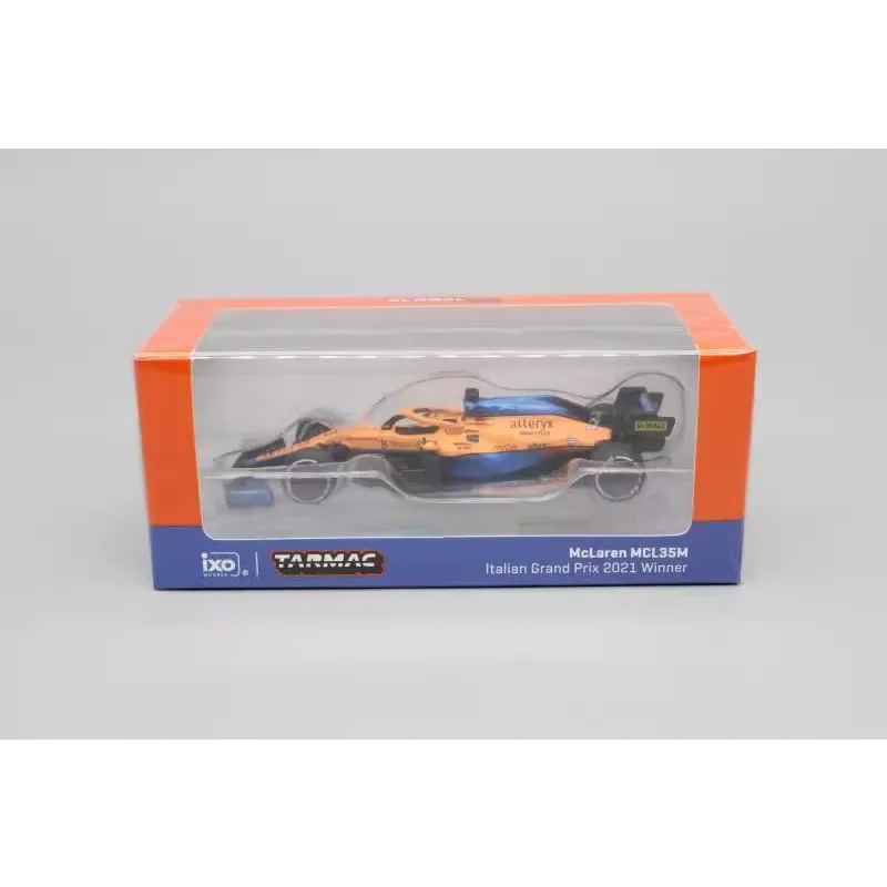 F1 Formula 1 model 1:64 Riccardo Norris MCL35M Italian Grand Prix decorated car model presents a child\'s Christmas present.