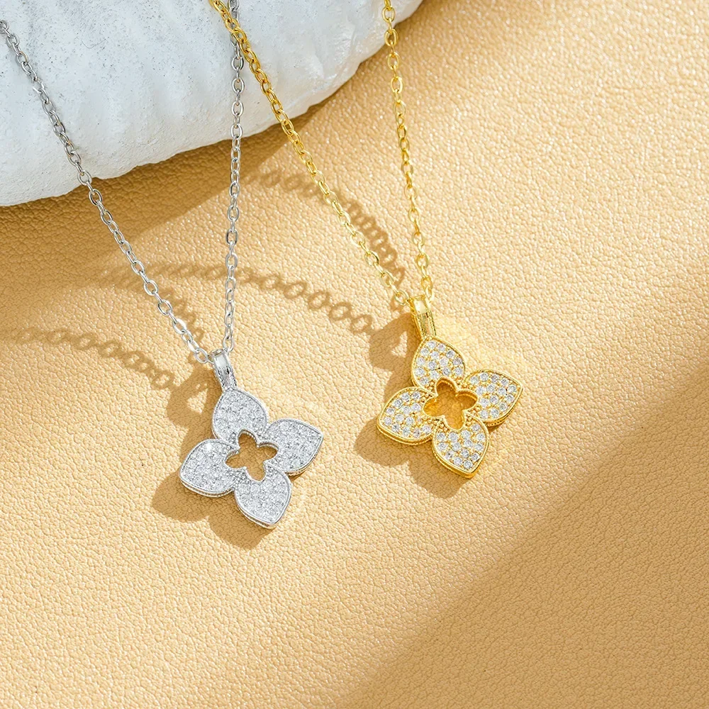 

A new light luxury women's necklace with a silver perforated four-leaf flower made of titanium steel in 2025
