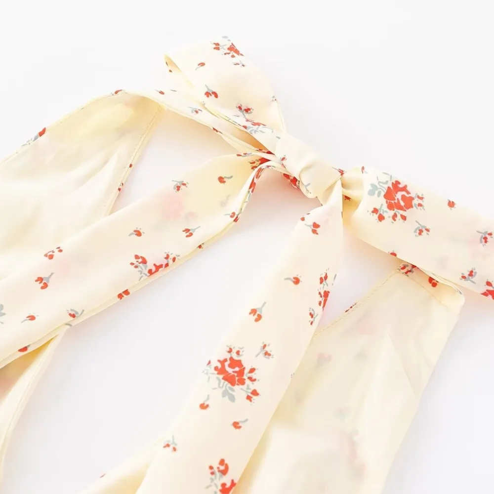 Seksowna jasnożółta sukienka z kwiatowym nadrukiem z kokardą na ramiączkach Letnia sukienka damska bez pleców z wąską talią Długie sukienki midi Robe Holiday