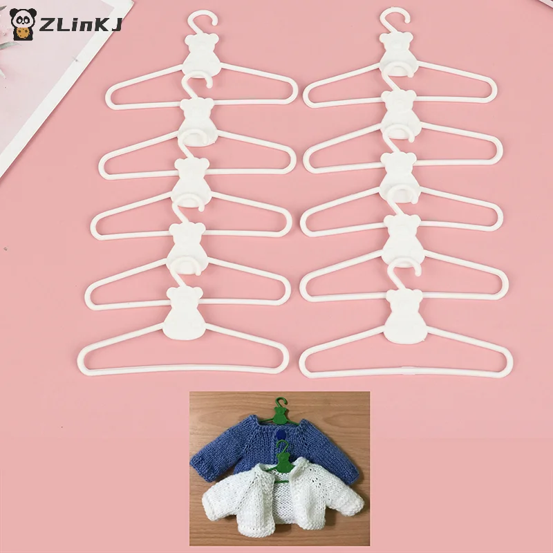 

▶ 10 шт. мини-вешалок белого цвета для кукольной одежды, пластиковые вешалки-зажимы для гардероба куклы