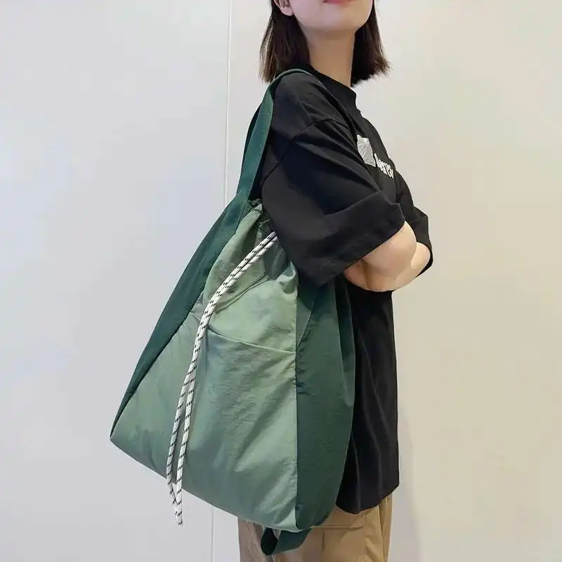 Simple Leisure Large Capacity Drawstring Nylon Backpack Popular Campus Versatile Student Shoulder Bucket Bags 2025 Newest