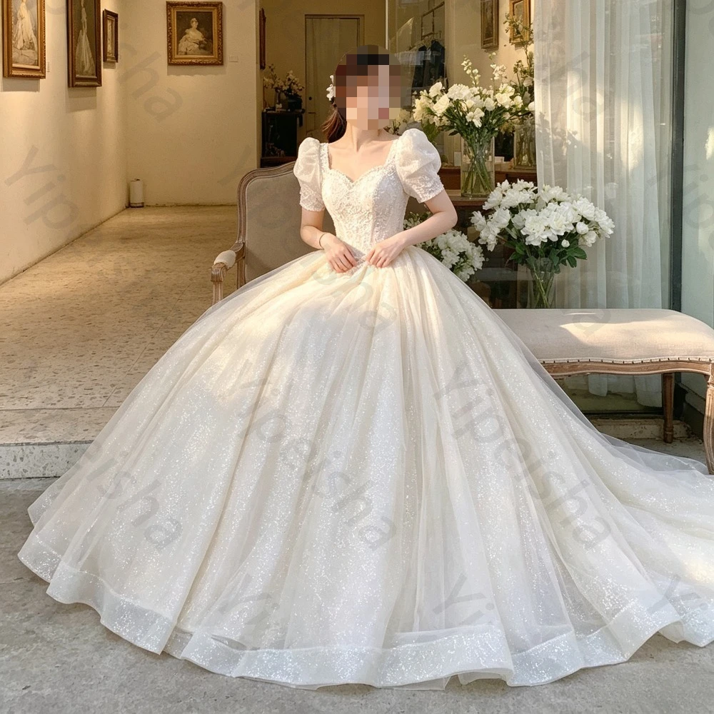 Customized Luxury Trailing Chiffon Sparkling Wedding Dress 2026 Bubble Sleeves Square Neck Fluffy Bridal Gown Suitable for Beach