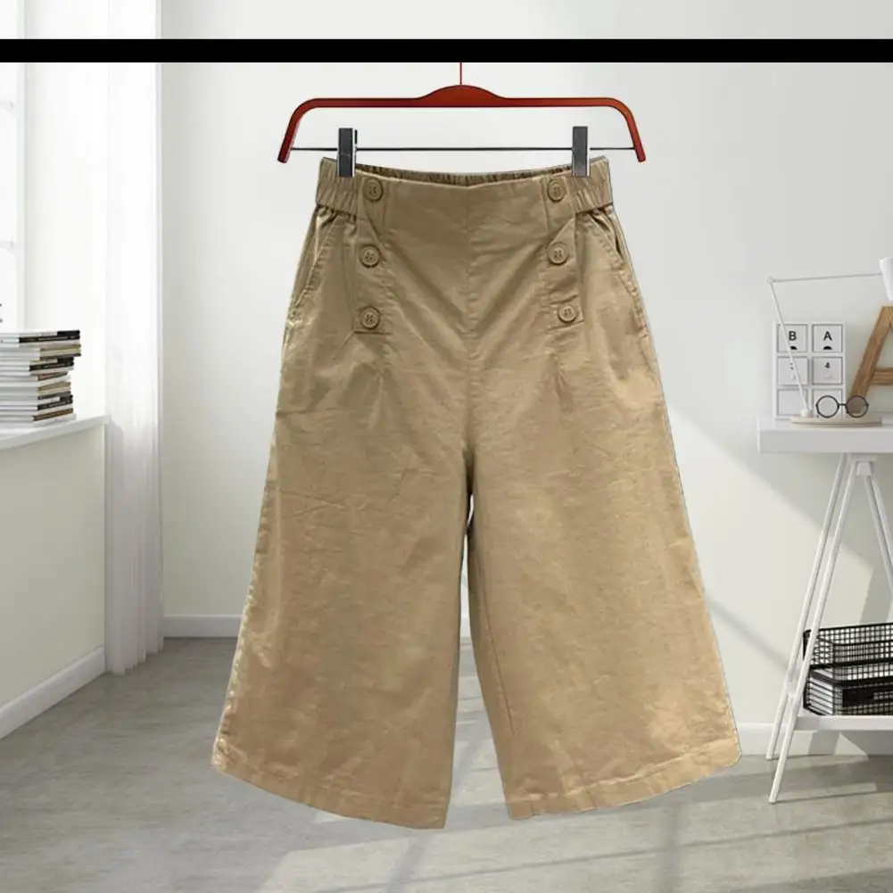 여성의 유행 단색 단추 주머니 느슨한 자른 바지 느슨하고 편안한 캐주얼 하렘 바지