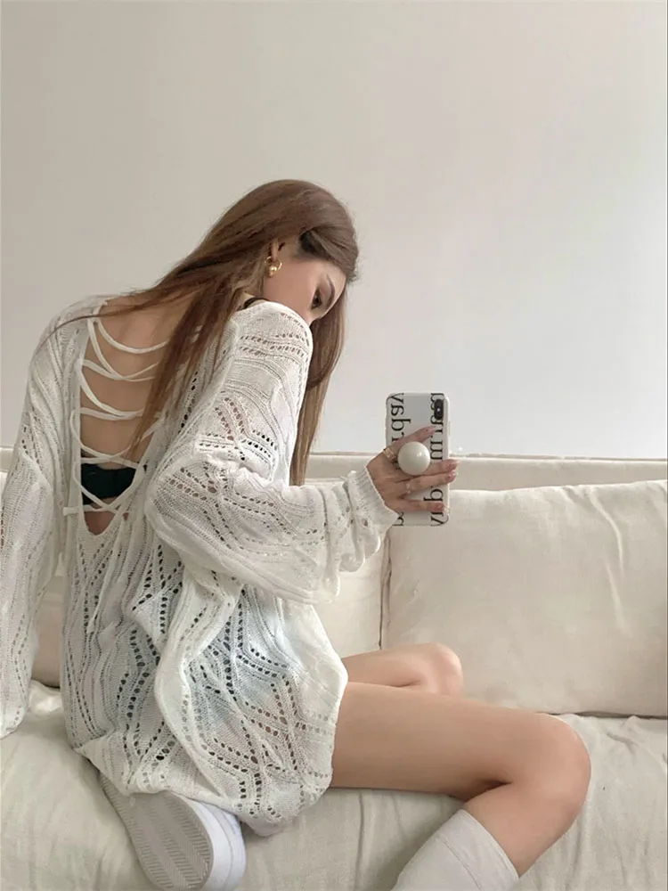 Lazy style spring and summer Korean version long sleeved temperament loose hollow out backless pullover knitted top