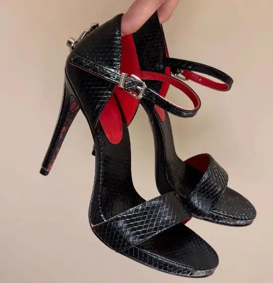 

Gold Metal Sword Shaped Stiletto Heel Sandals Women Black Snakeskin Leather One Line Buckle Strap Cover Heel High Heel Sandals