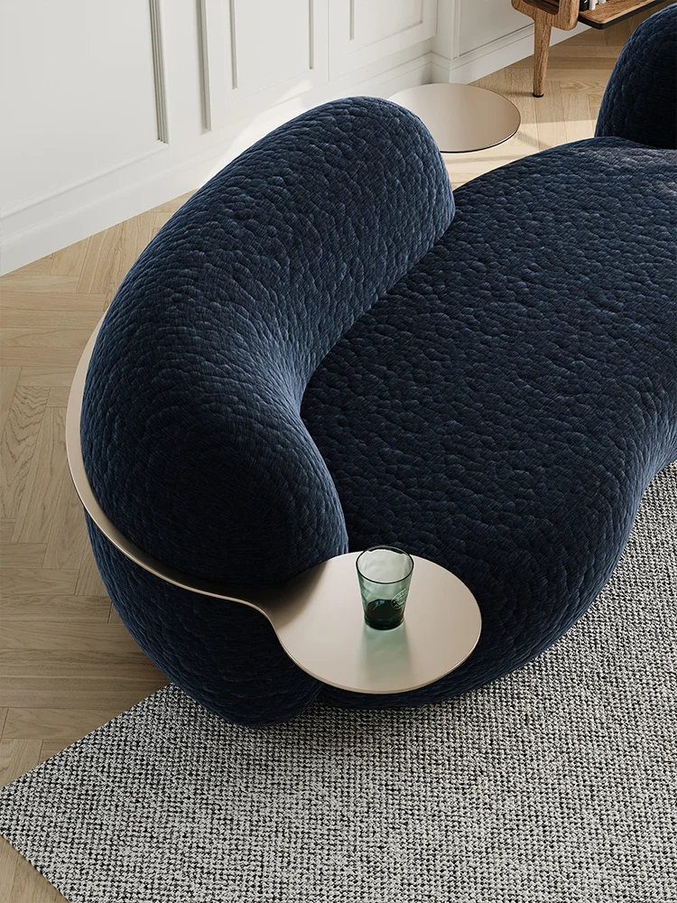 

Cream wind Internet celebrity designer living room small apartment fabric curved pea cashew sofa beauty salon clothing st