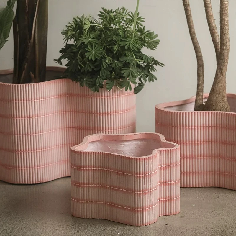 

Pastoral high-end imitation cement flower pot irregular household outdoor shopping mall clothing store