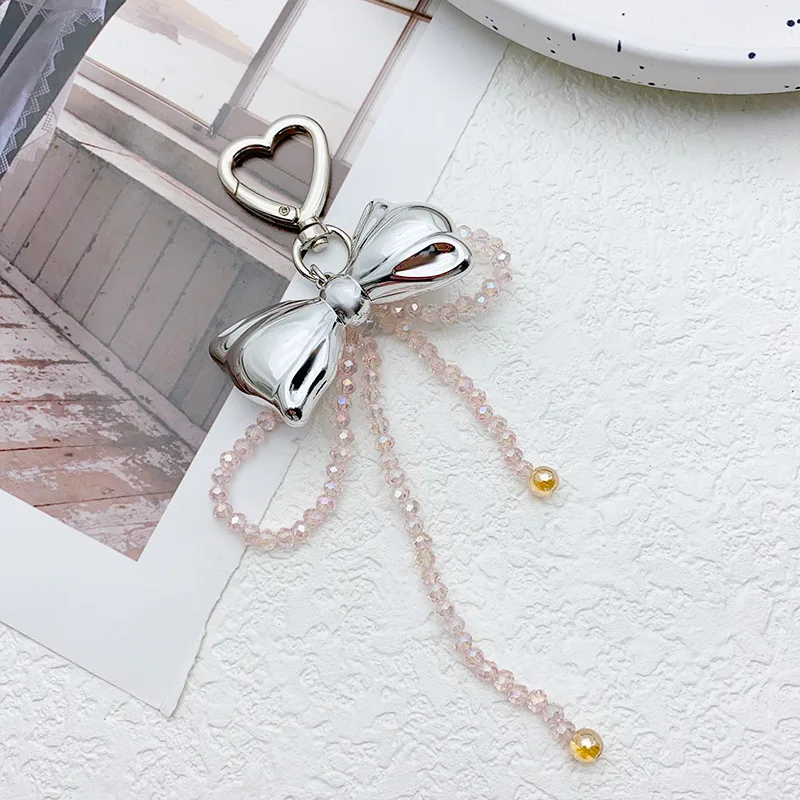 

Asymmetrical Crystal Bow Keychain - Metal Beaded Phone Pendant & Bag Charm Accessory (Sparkling Gift)