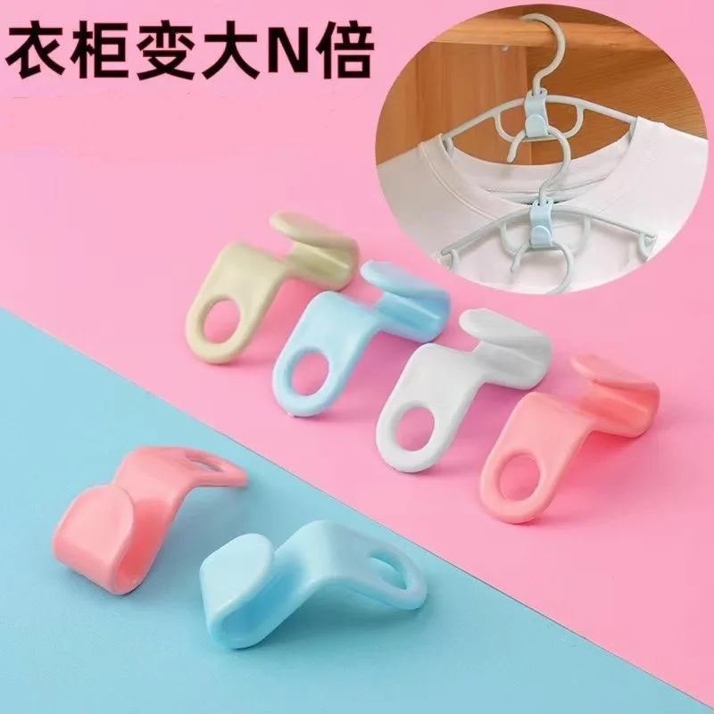 Stackable garment hanger connector hook for compact wardrobe organization • lightweight plastic design • supports 1 to 3 kg load