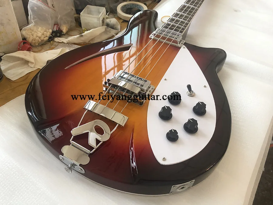 

electric bass guitar,Semi hollow body, Rosewood Fingerboard，4005 4 Strings, Sunset color，high quality，free shipping