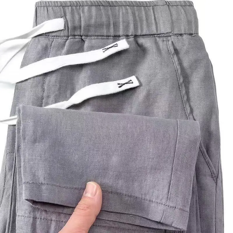 กางเกงขายาวผ้าฝ้ายลินินสำหรับผู้ชาย ใส่สบาย ระบายอากาศได้ดี เหมาะสำหรับใส่ในชีวิตประจำวัน สไตล์ลำลอง ทรงหลวม ขาตรง เหมาะสำหรับวัยรุ่น