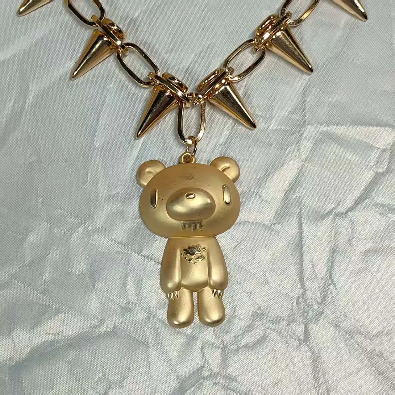 Super cool bear necklace. Golden chain with spikes and bear pendant. Full of sweet - cool style, very eye - catching～