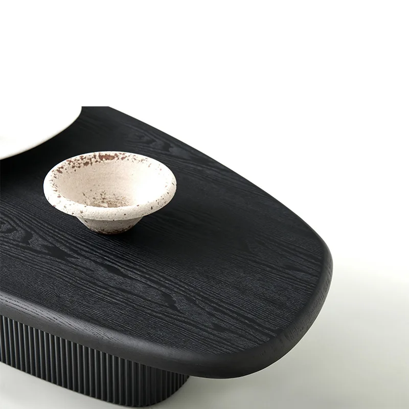 Italian minimalist special-shaped splicing rock slab coffee table living room black and white contrasting color designer solid