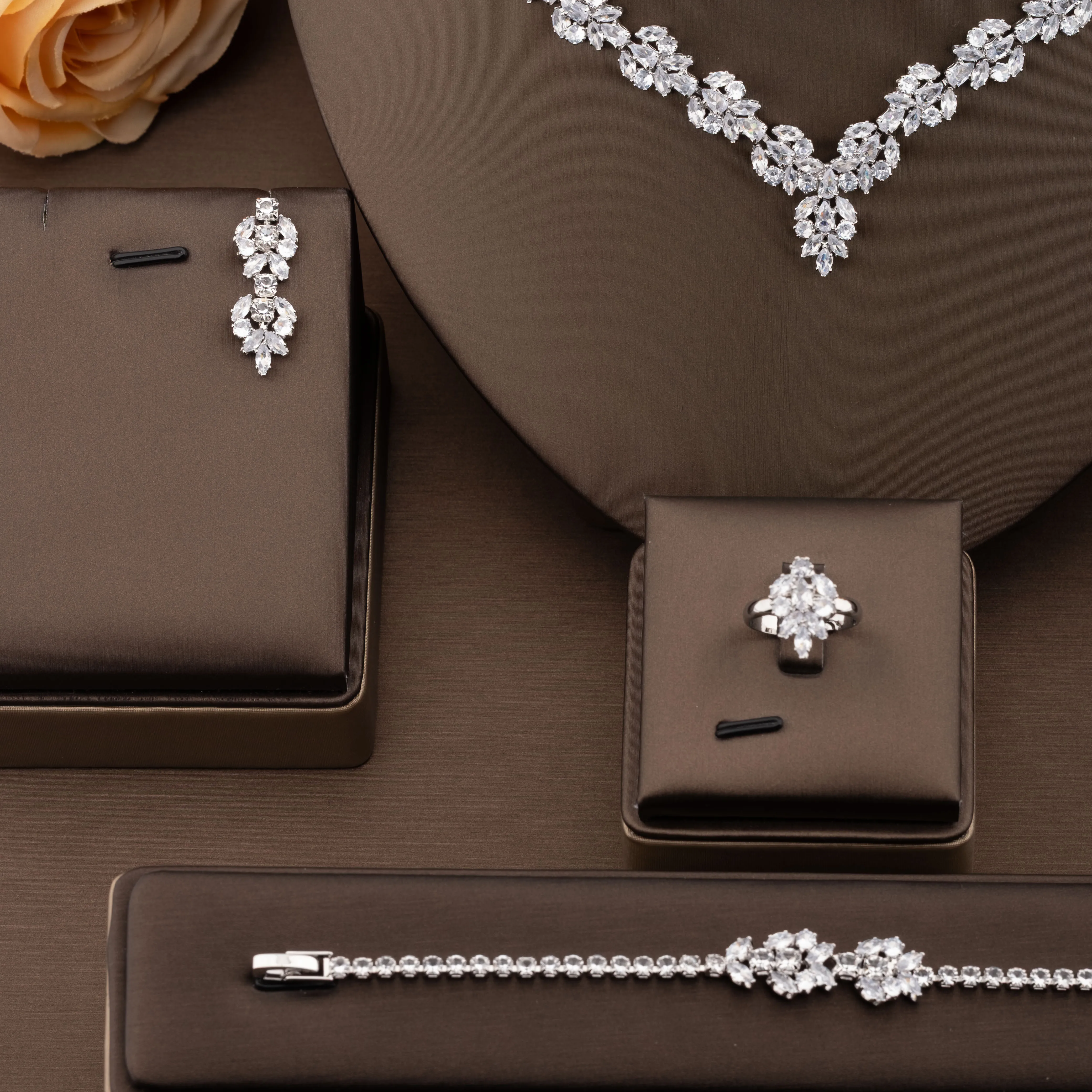 1 set of elegant jewelry set with sparkling cubic zirconia flower cluster design suitable for women to wear at weddings and banquets. Gift box not included