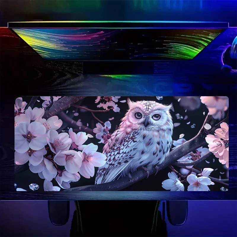 

The owl and cherry blossom mouse mat, with its bright night-time floral design, is suitable for both offices and gaming