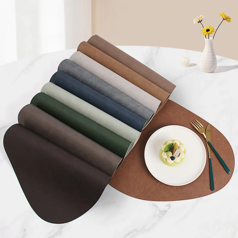 Amazon water drop-shaped placemats, featuring a cowhide texture on both sides, are heat-resistant and can be used as table mats