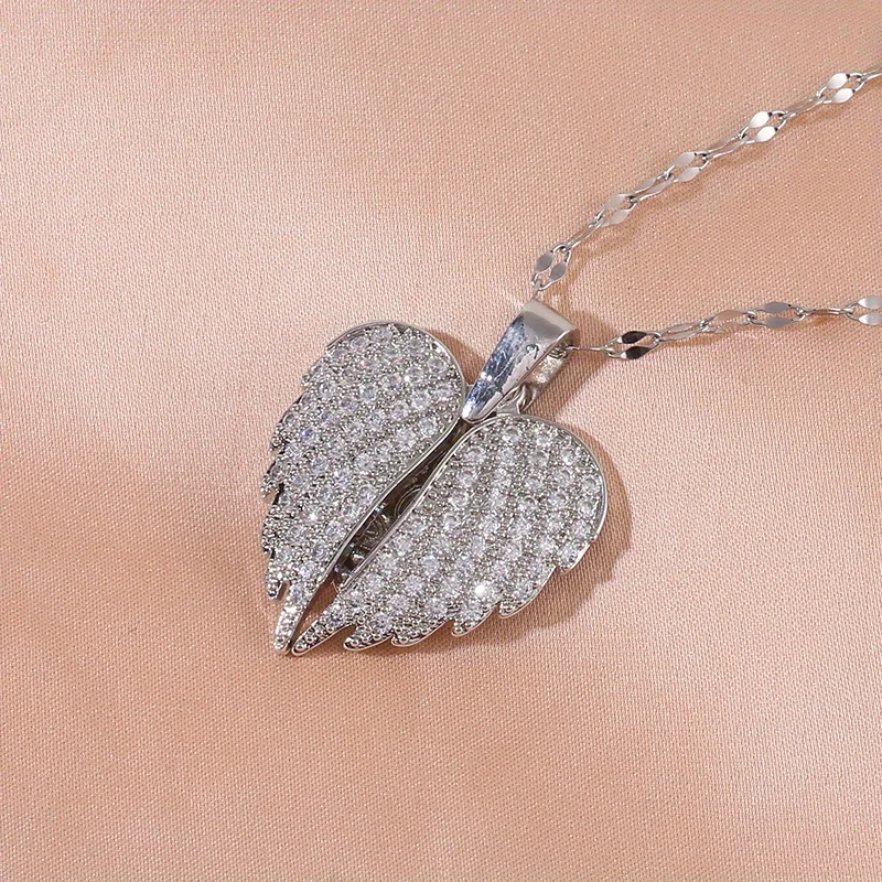 [برونزية] قلادة على شكل حرف "I Love You" الأوروبية والأمريكية قابلة للسحب على شكل جناح الملاك هدية للذكرى السنوية