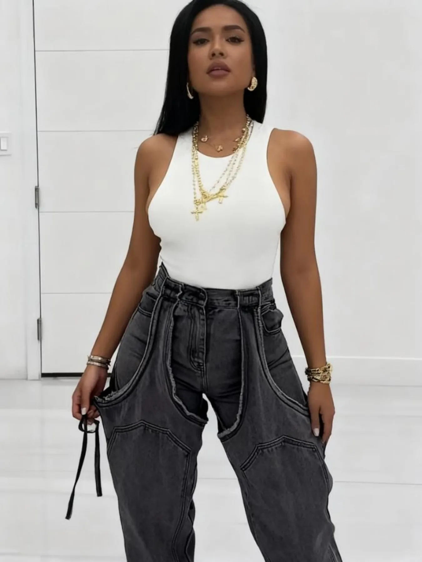 Luźne jeansy damskie w stylu Y2K z wycięciami, spodnie patchworkowe z wysokim stanem i elastycznym, streetwearowym stylem.