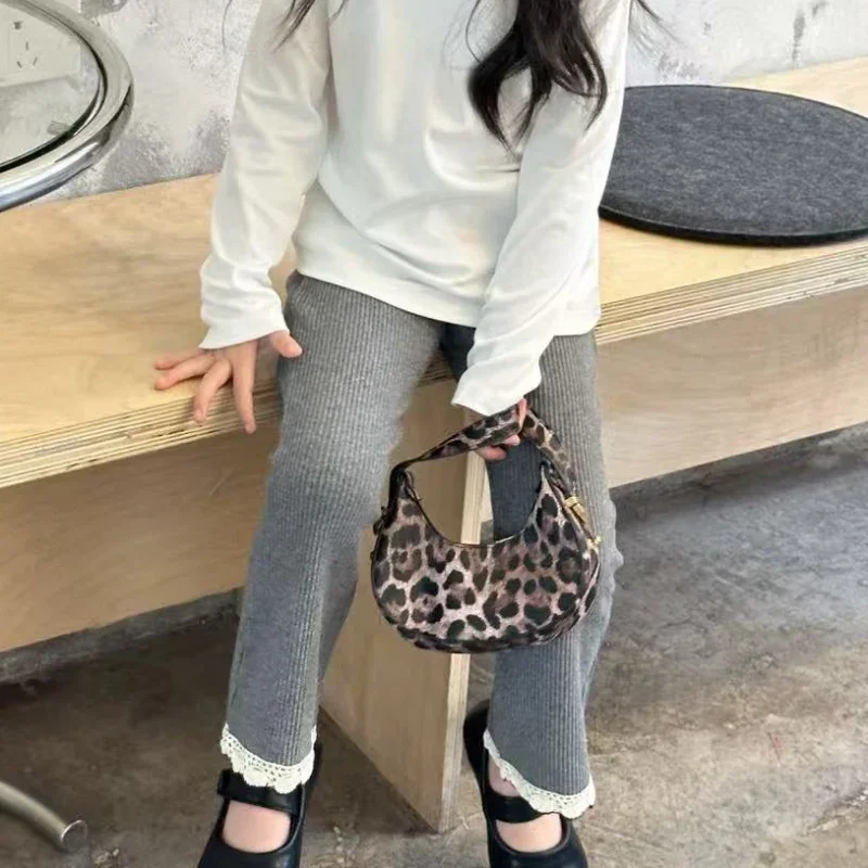 الأطفال عارضة السراويل البسيطة الخريف والشتاء جديد الكورية نمط الفتيات طماق القطن بلون تمتد جرس قيعان Amagi