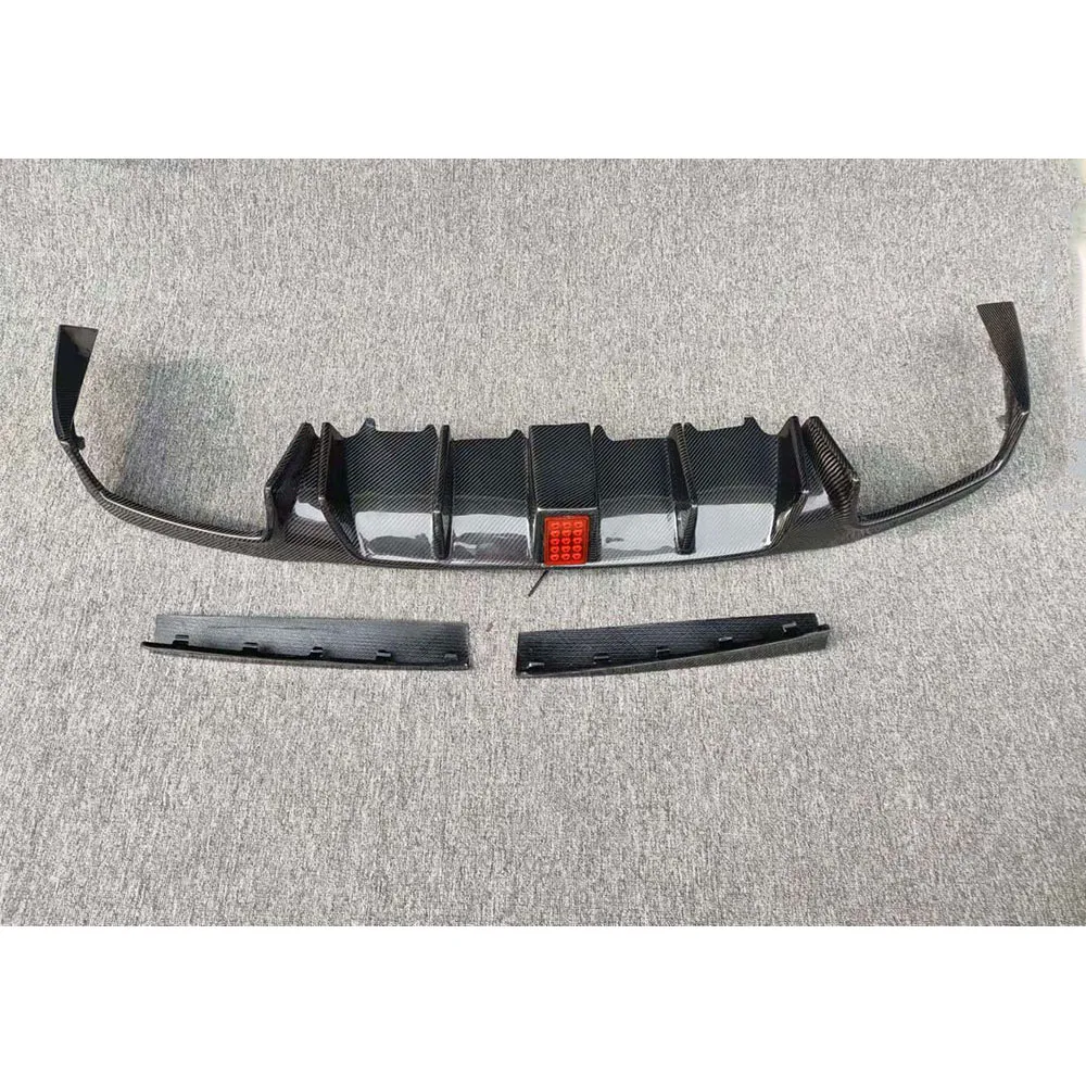 Picture 5: E Class B Style Carbon Fiber Rear Bumper Lip Diffuser with Light for Benz W213 E200 E260 E300 E63 AMG 2017 2018 2019 Tuning