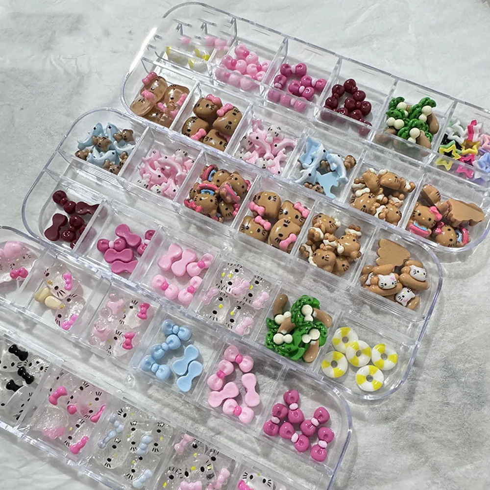 12 grilles dessin animé bronzage Kitty breloques pour ongles 3D peau noire hawaïenne HelloKitty décorations pour ongles y2k arc Hello Kitty strass pour ongles