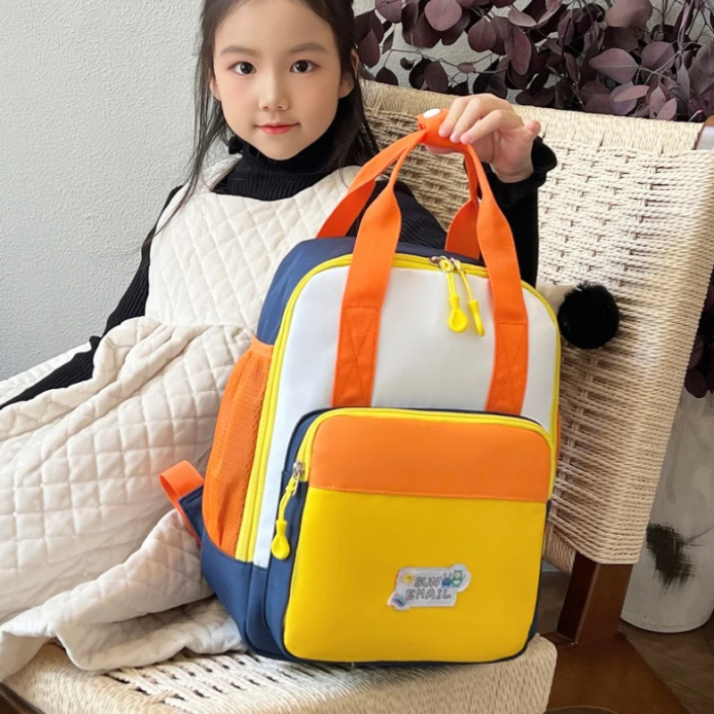 

Стильный рюкзак для малышей с цветными блоками для детей 4, 5, 6 лет, легкая школьная сумка для детского сада и дошкольного возраста для мальчиков и девочек с верхней ручкой