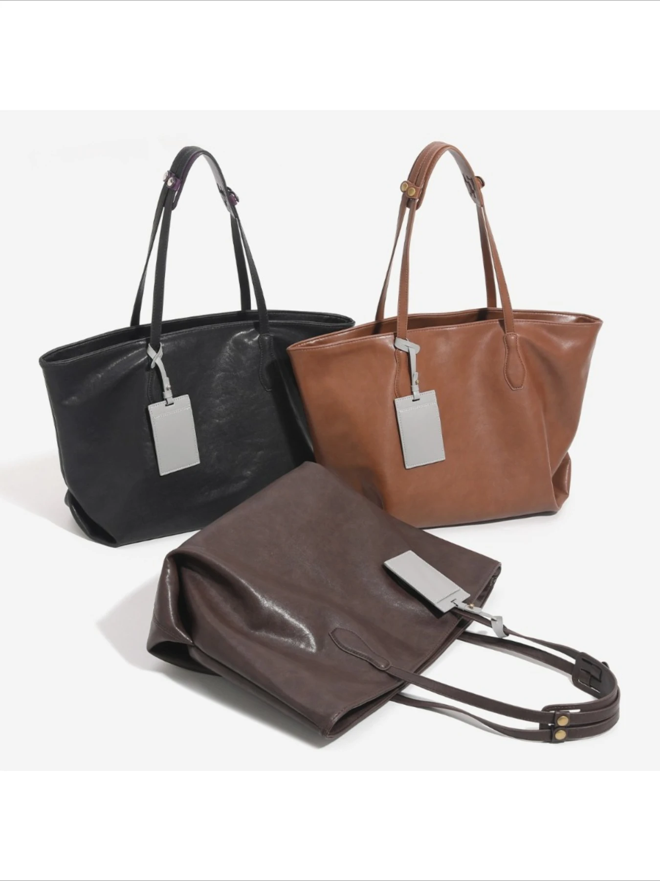 

Stylish and simple soft leather tote bag with card women's 2026 new large-capacity commuter versatile student handbag