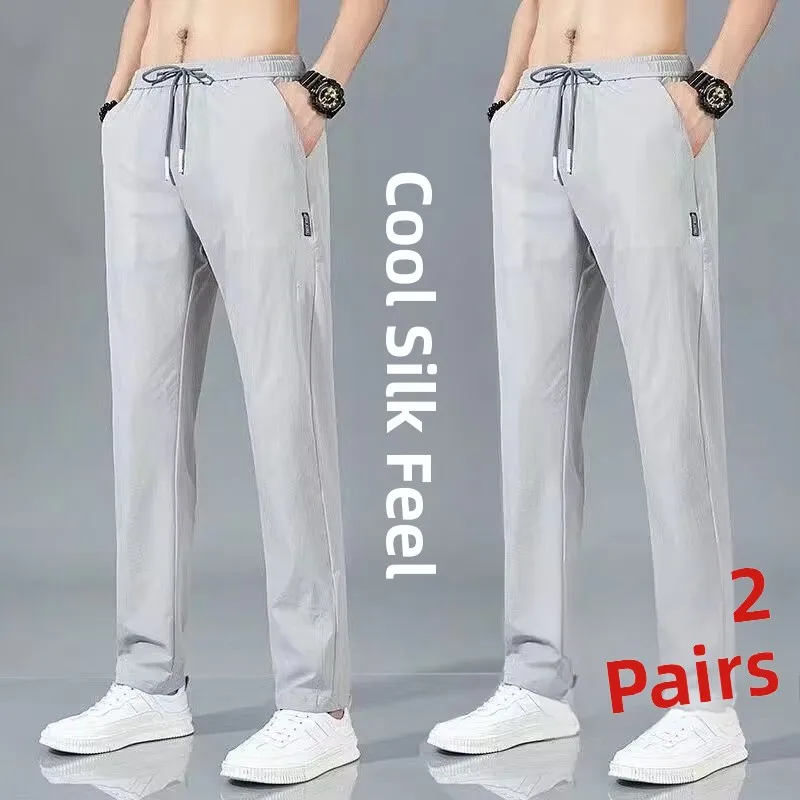 Pantaloni estivi sottili casual in seta di ghiaccio da uomo larghi di grandi dimensioni elastici versatili resistenti all'usura sport gamba dritta da uomo alla moda Tr...