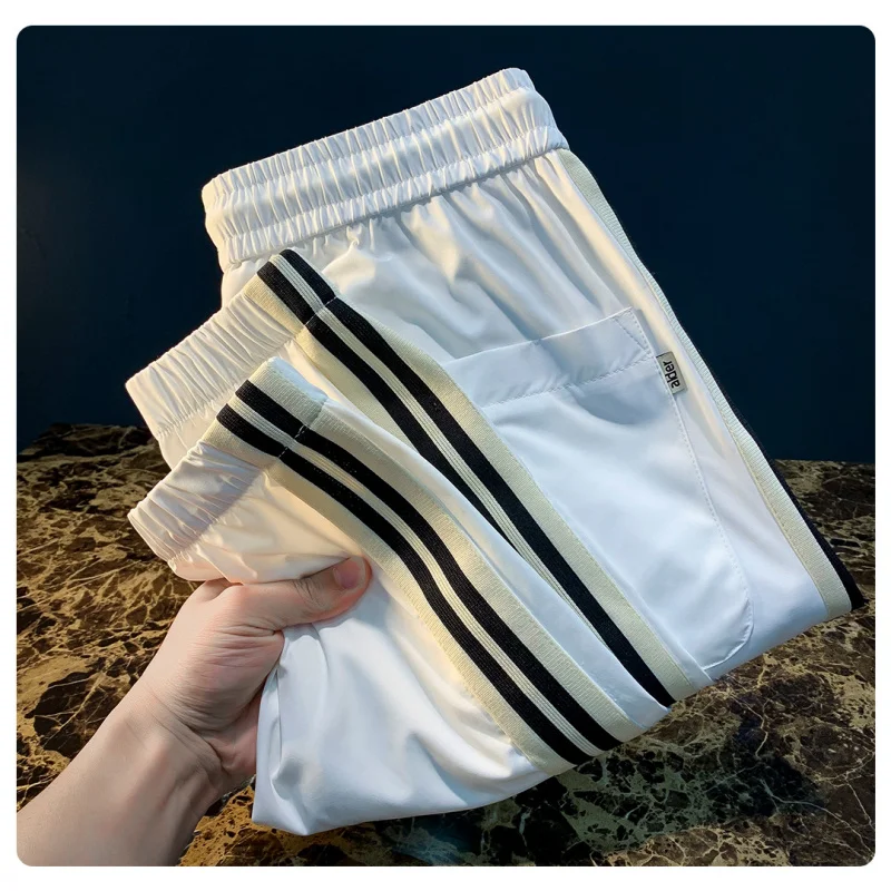 

Summer thin ice silk casual pants for men, breathable, trendy, embroidered, simple, versatile, quick drying sports pants