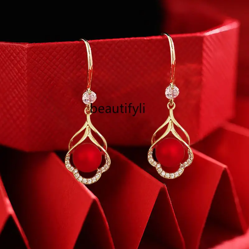 

Red festive pearl earrings women's 999 sterling silver ear hook temperament Chinese style design sense niche earrings