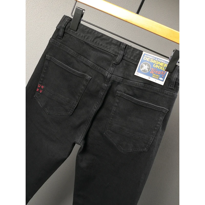 ハイエンドのミニマリストブラックジーンズ、メンズストリートウェアトレンド、伸縮性があり、細身のファッションパンツ