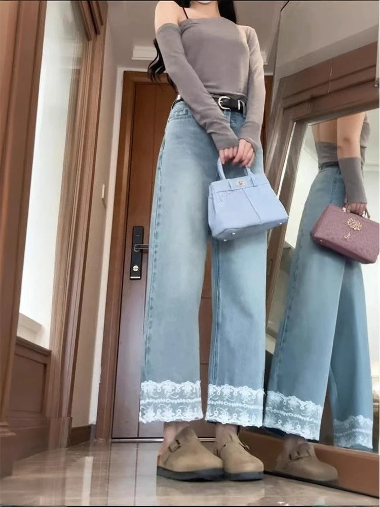 

Light blue lace trimmed nine cropped jeans women spring 2026 new high waisted design sense versatile commuting pants