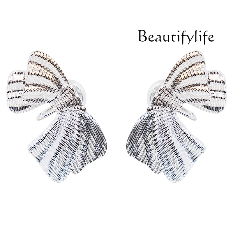 

Unique bow ear clips for women without ear piercings, new niche high-end earrings, painless mosquito coil disc