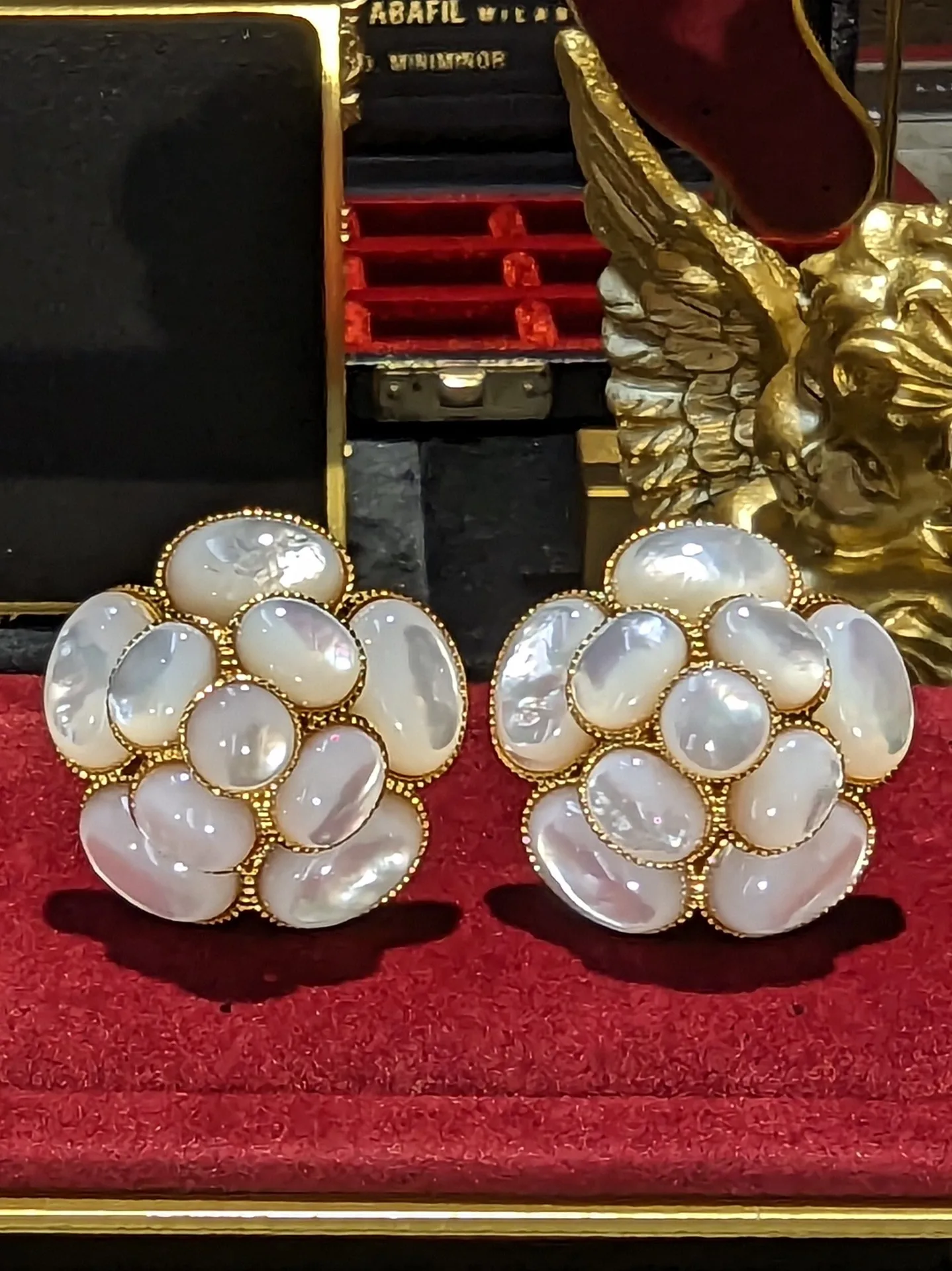 

Classic camellia earrings from a niche designer