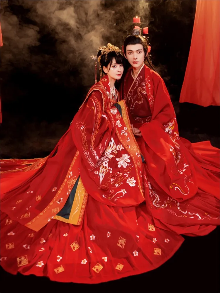

Hanfu a traditional Chinese wedding dress for women features phoenix crown red cape long tail and large gown