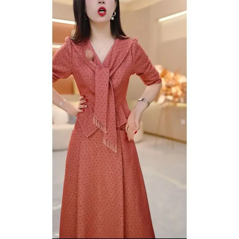 High fashion design sense top+half skirt polka dot two-piece set 2025 autumn and winter new age reducing temperament set