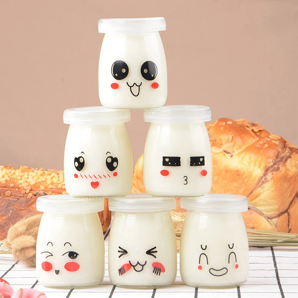 

8Pcs Glass Yogurt Bottles with Adorable Cartoon Faces Portable Snack Jars for Easy Clean Milk Dessert Storage