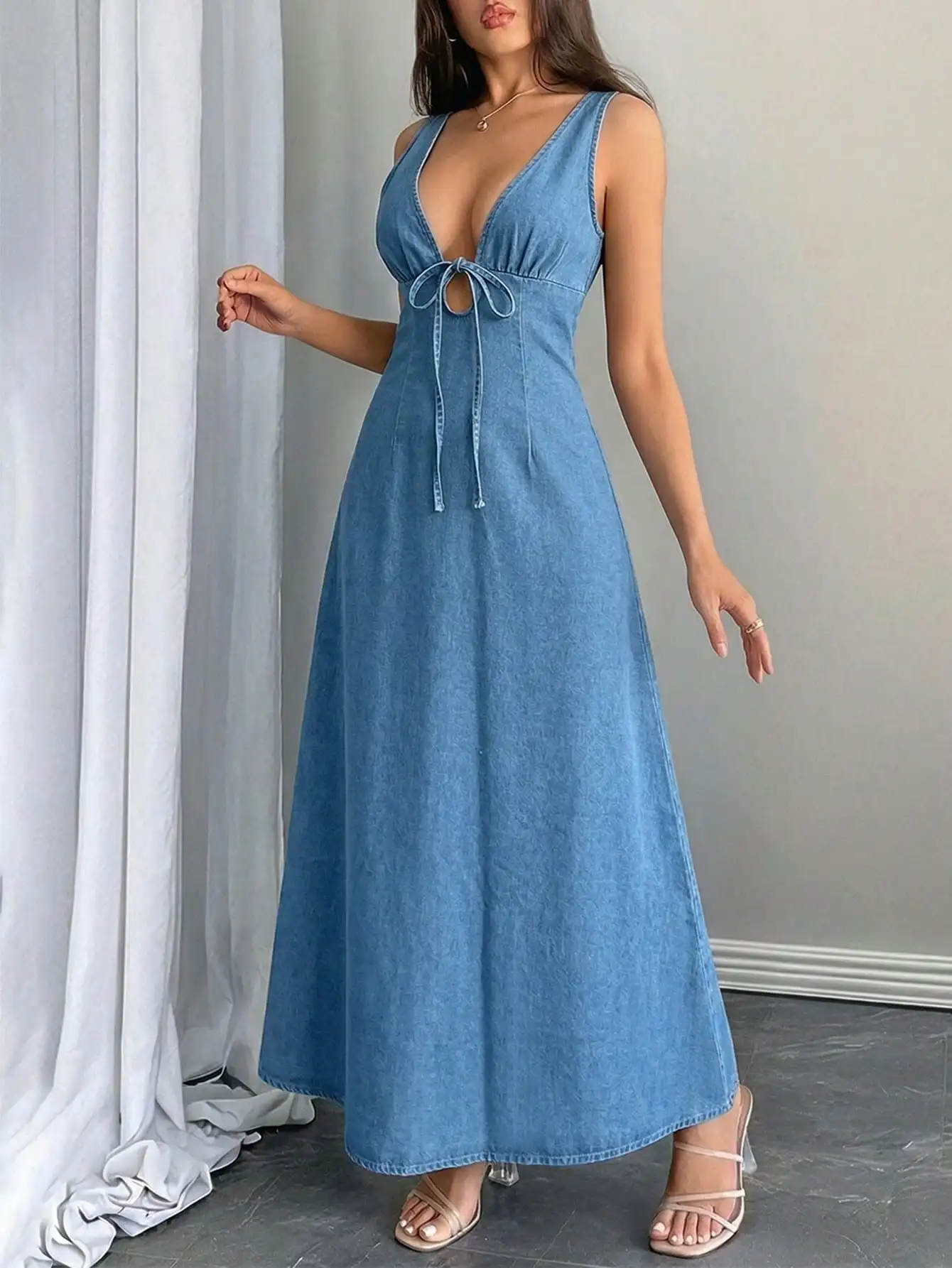 

Deep Blue Denim Maxi Dress With V-Neck, Front Tie Detail, Flowy Fit For Summer, Office, Beach Or Special Occasions