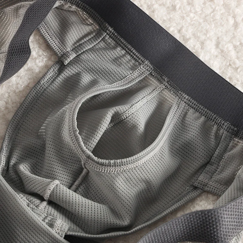Men's Underwear Ice Silk Ultra-Thin Boxers Summer Mesh Breathable Panties Side Open Pouch Separation Underpants Bikini Trunks