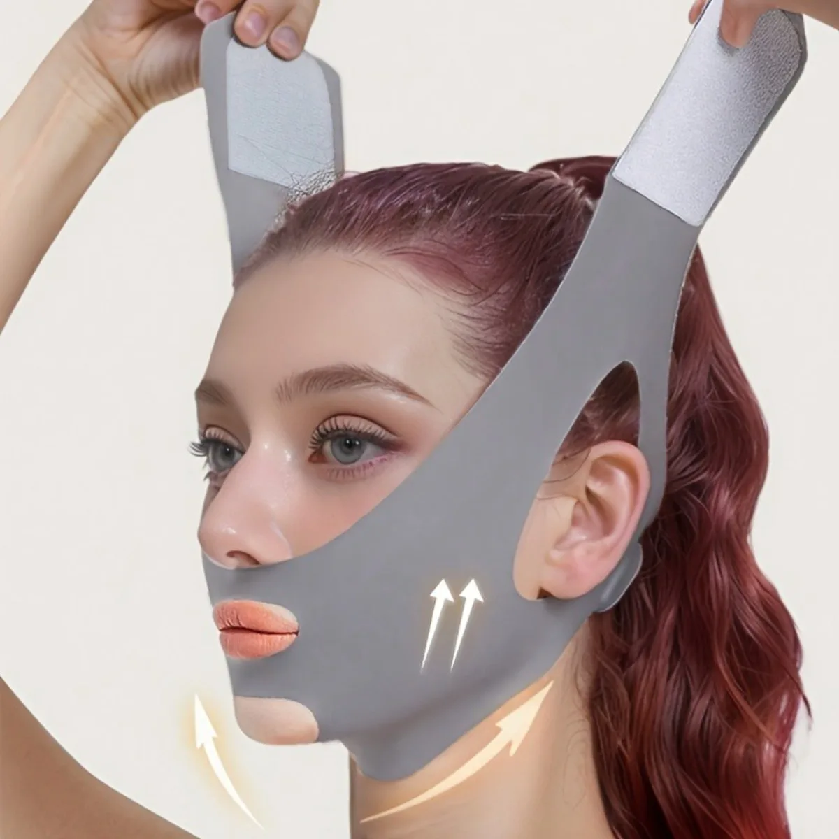 Gray V-shaped bandage, unisex, lifts and firms the face, reducing nasolabial folds; breathable material, seamless design.