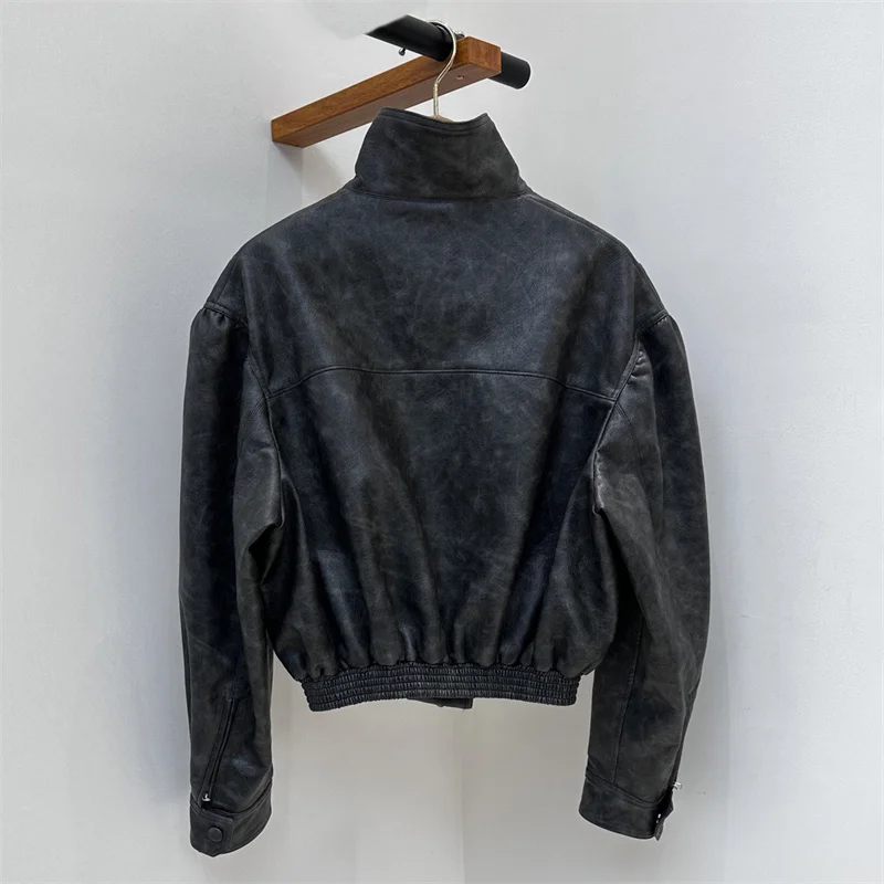 Chaqueta de cuero para mujer nueva chaqueta de motocicleta a prueba de viento con cuello levantado de invierno 2025 abrigo asimétrico de cuero Artificial para mujer