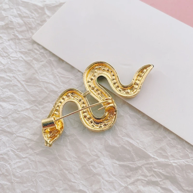 Luxurious Snake Designs Brooch in Gold Color with Fine Craftsmanship Suitable for Parties and Special Occasion