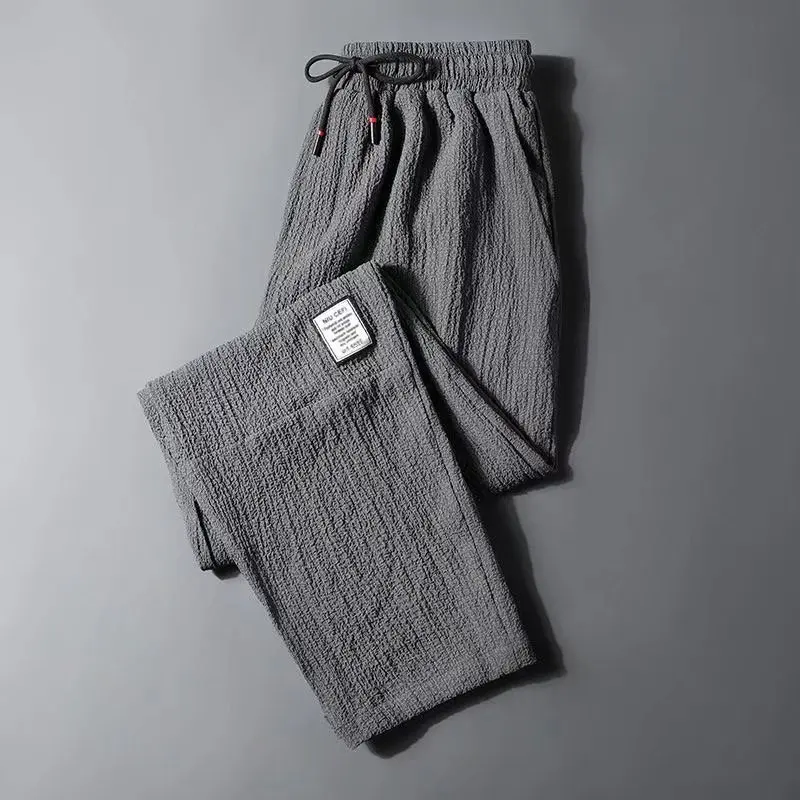 Pantaloni lunghi estivi da uomo in seta di ghiaccio sottile a nove punti, casual, gamba dritta, sportivi, Qui Dry, pantaloni lunghi in lino da ragazzo alla moda, sensazione di freschezza