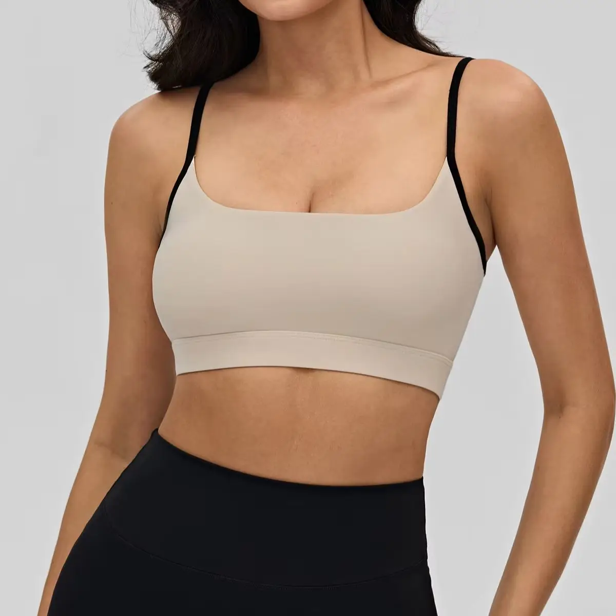 Women's sports bra with contrast thin straps, buttery-soft fabric, removable pads, square neck and sleek square open back.